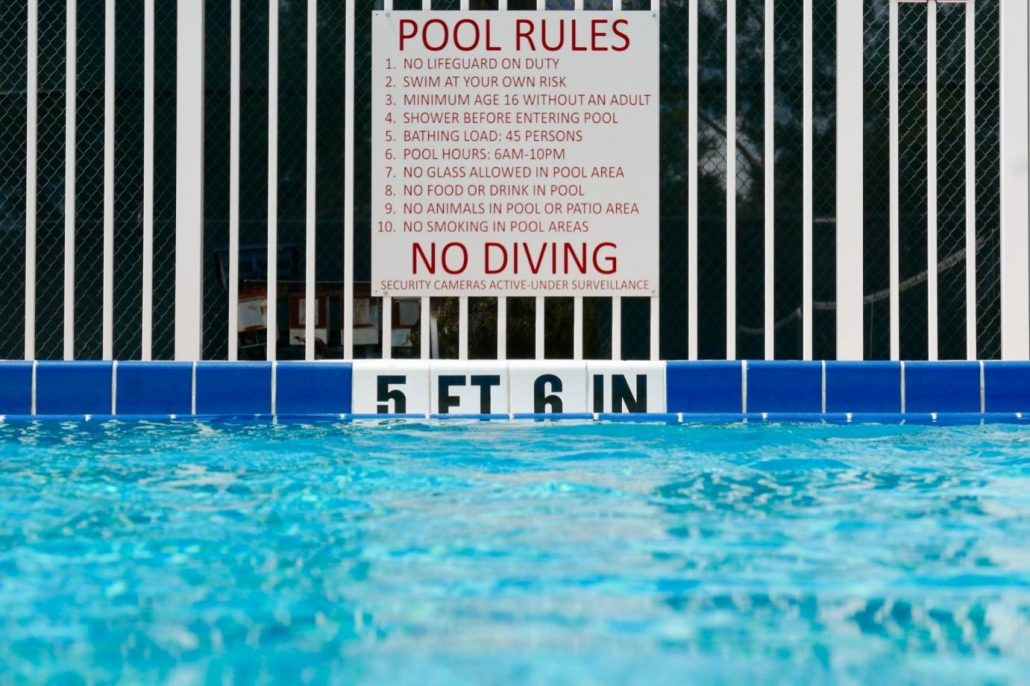 Public pool safety markings and signs